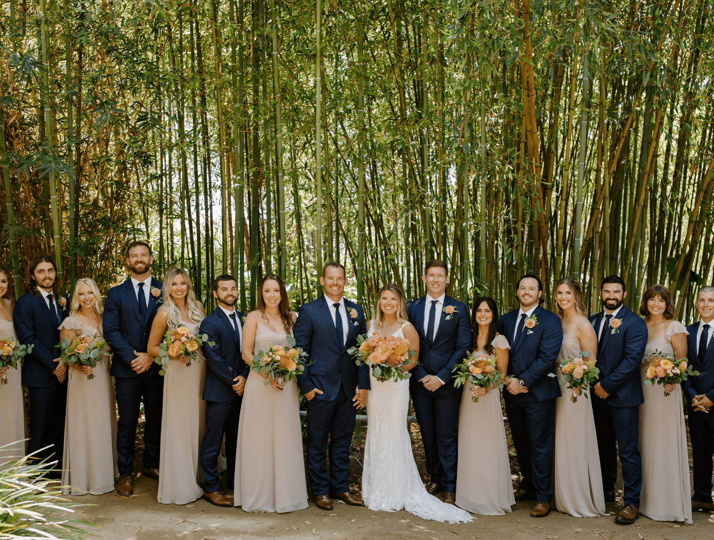 Wedding pary against tall bamboo